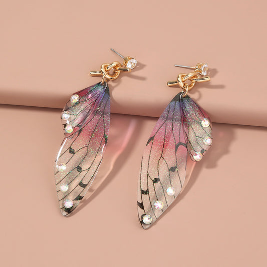 Aretes Largos con Flecos – Estilo Moderno y Elegante